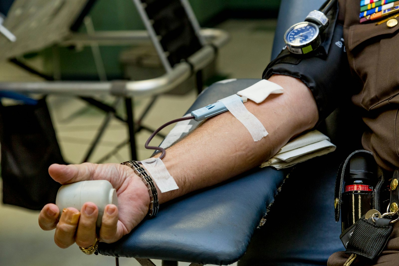 A blood donor at a community blood drive